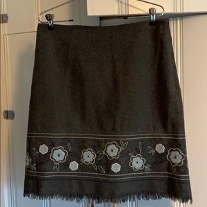 Cute grey wool skirt w/light blue floral design.